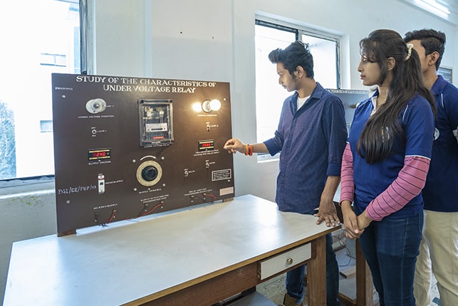 Electrical Engineering students are testing in Power system I Lab